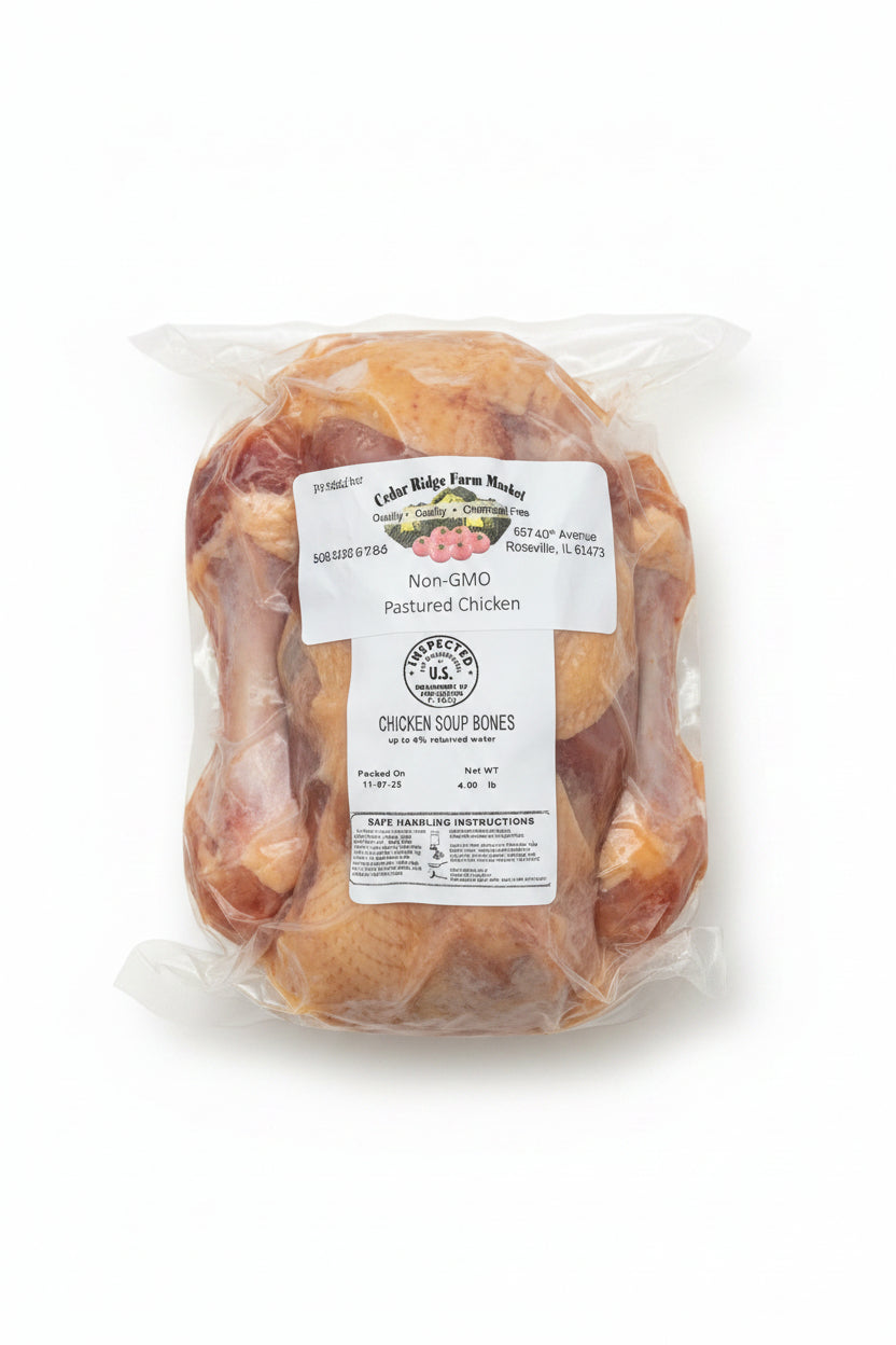 Packaged chicken soup bones with a label on a white background