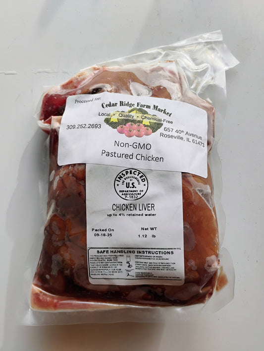 Packaged chicken livers with a label on a white background