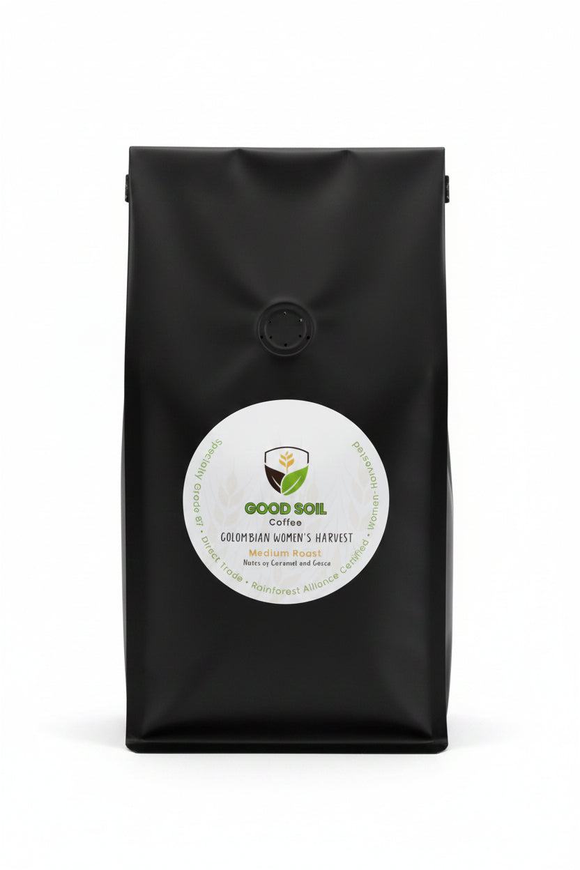 Black coffee bag with a visible brand label on a light surface