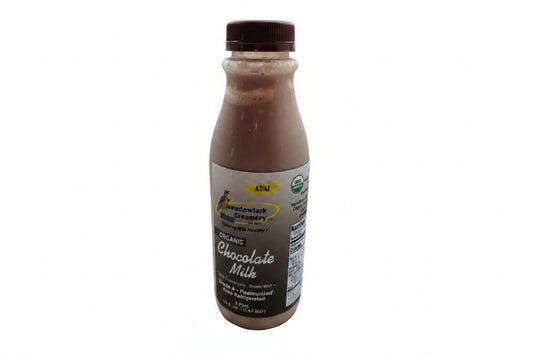 Bottle of Meadowlark Creamery Organic Chocolate Milk on a white background