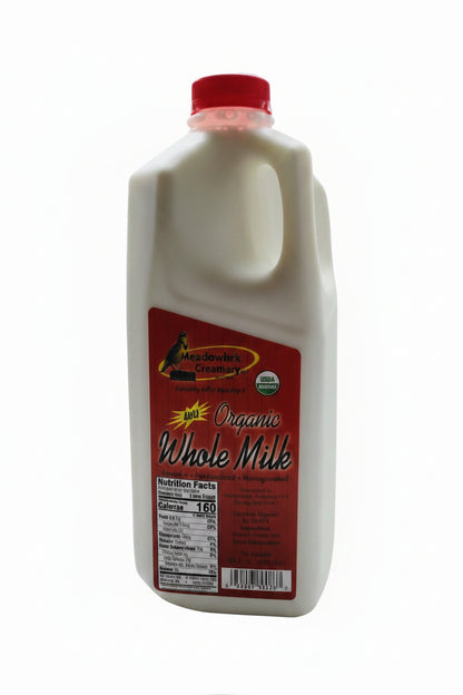 hallf galllon container of organic a2a2 whole milk with a red label on a white background